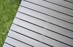 Refinishing Decks on an Industrial Level close up of composite deck