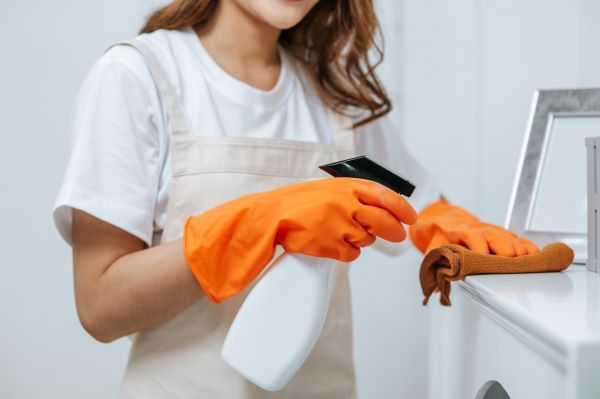 close-up-hand-housekeeper-woman-rubber-gloves-use-cleaning-solution-spray-bottle